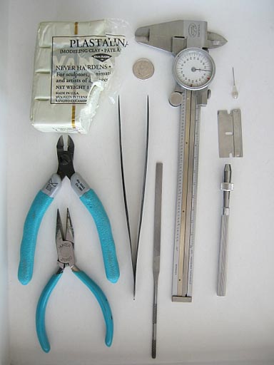 Tools used for fitting pin-caps to briolettes.